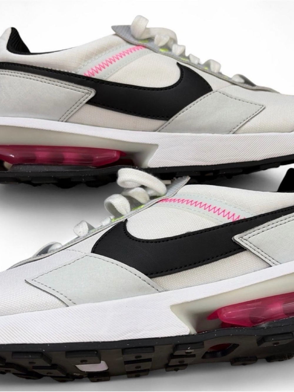 Nike mens 9.5 women’s 11White/Black Running Sneakers with Pink Accents
